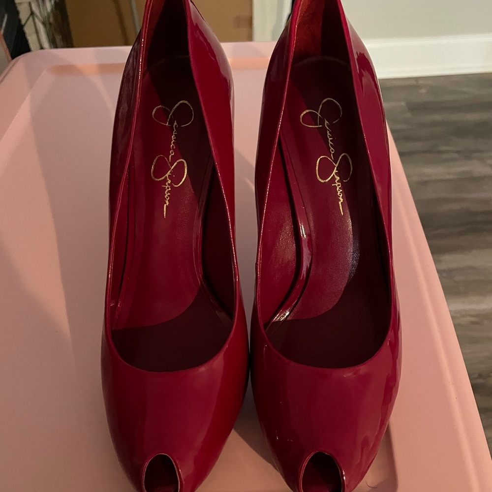 Red patten leather pumps